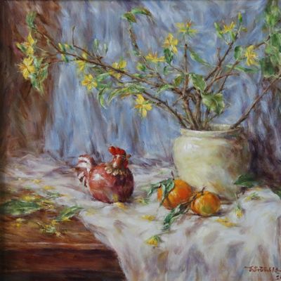 Yellow apricot blossoms, tangerines and small pottery chicken. Jan. 2018.