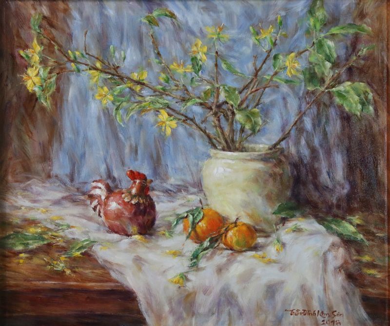 Yellow apricot blossoms, tangerines and small pottery chicken. Jan. 2018.