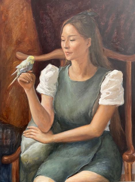 Thiếu nữ và chú chim nhỏ