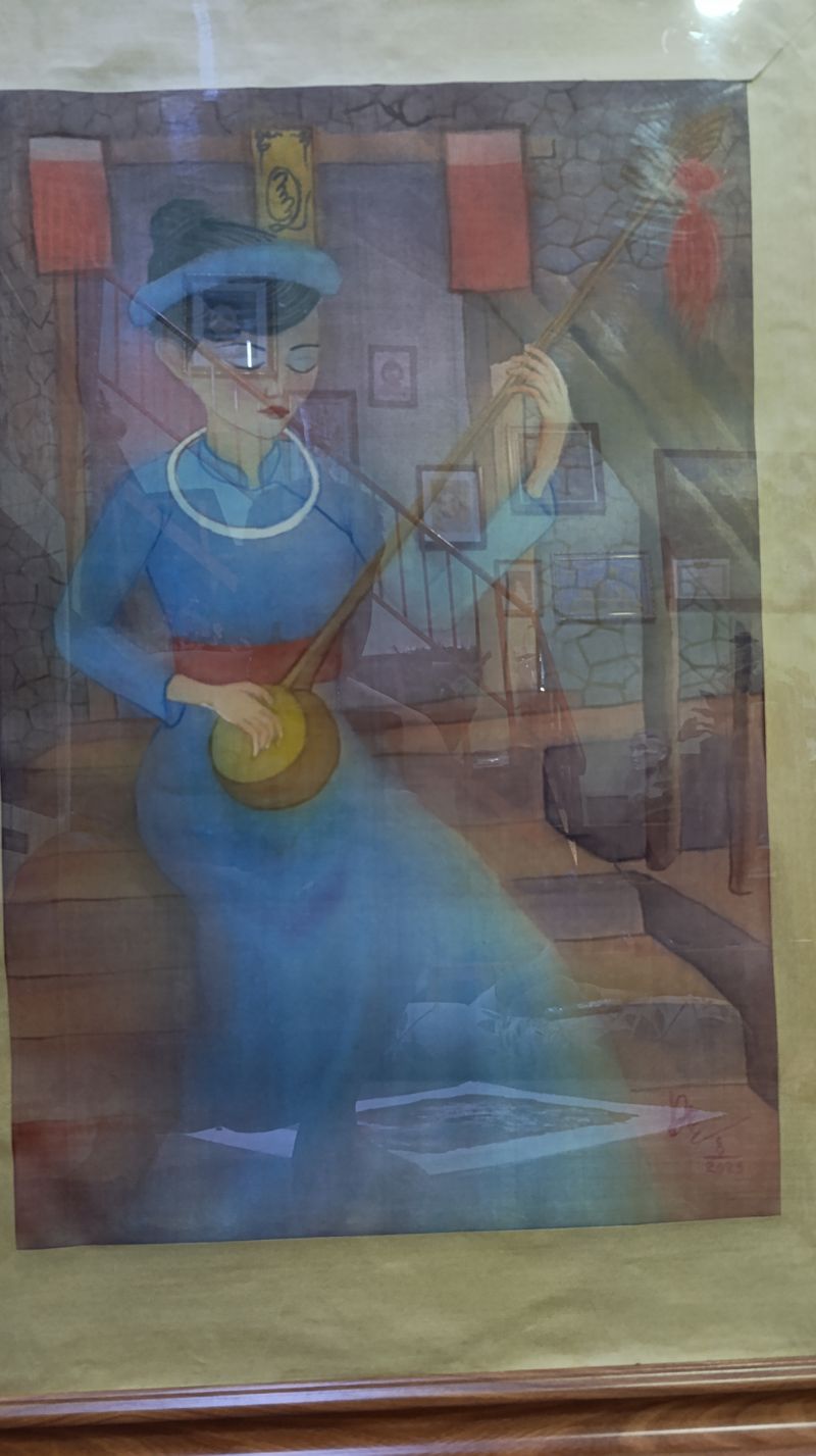 Thếu nữ và cây đàn