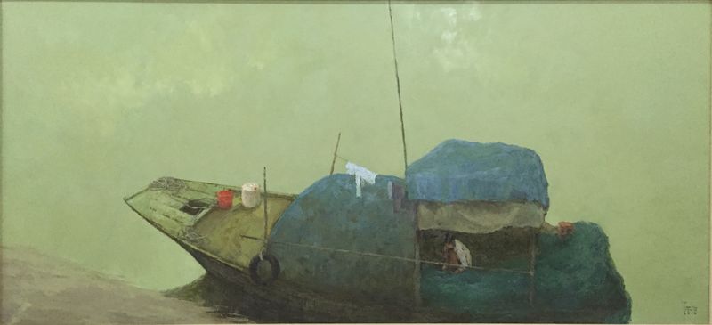 The man who is patching the fishing net