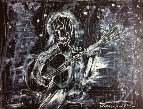 Guitarist giữa phố đêm mưa
